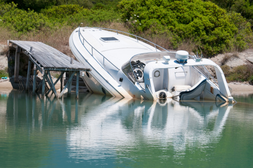 image of half submerged boat