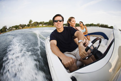 image of man driving boat